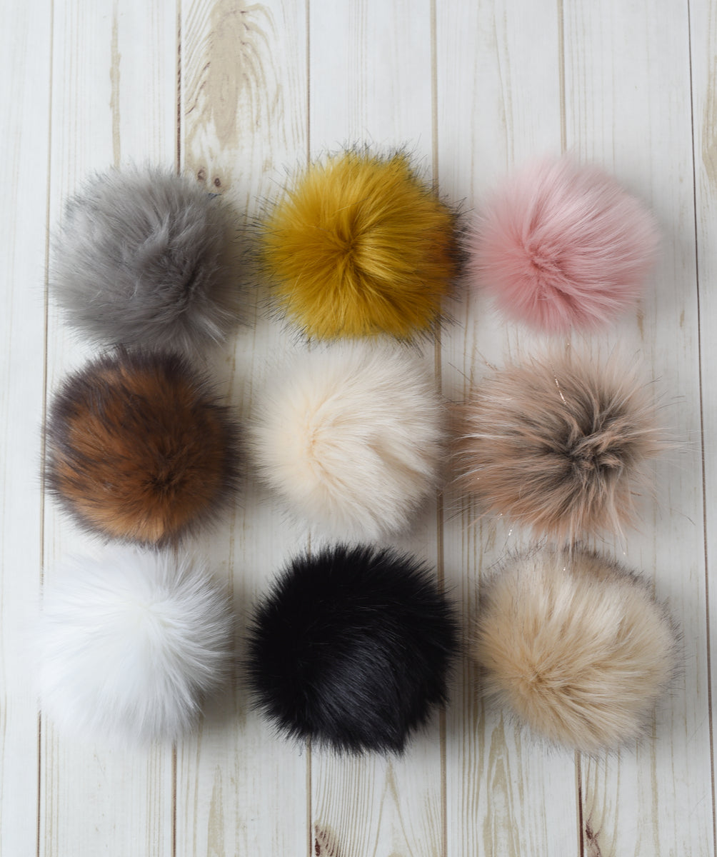 The Beauty and Warmth of Natural Fur Pom-Poms for Hats - FOX